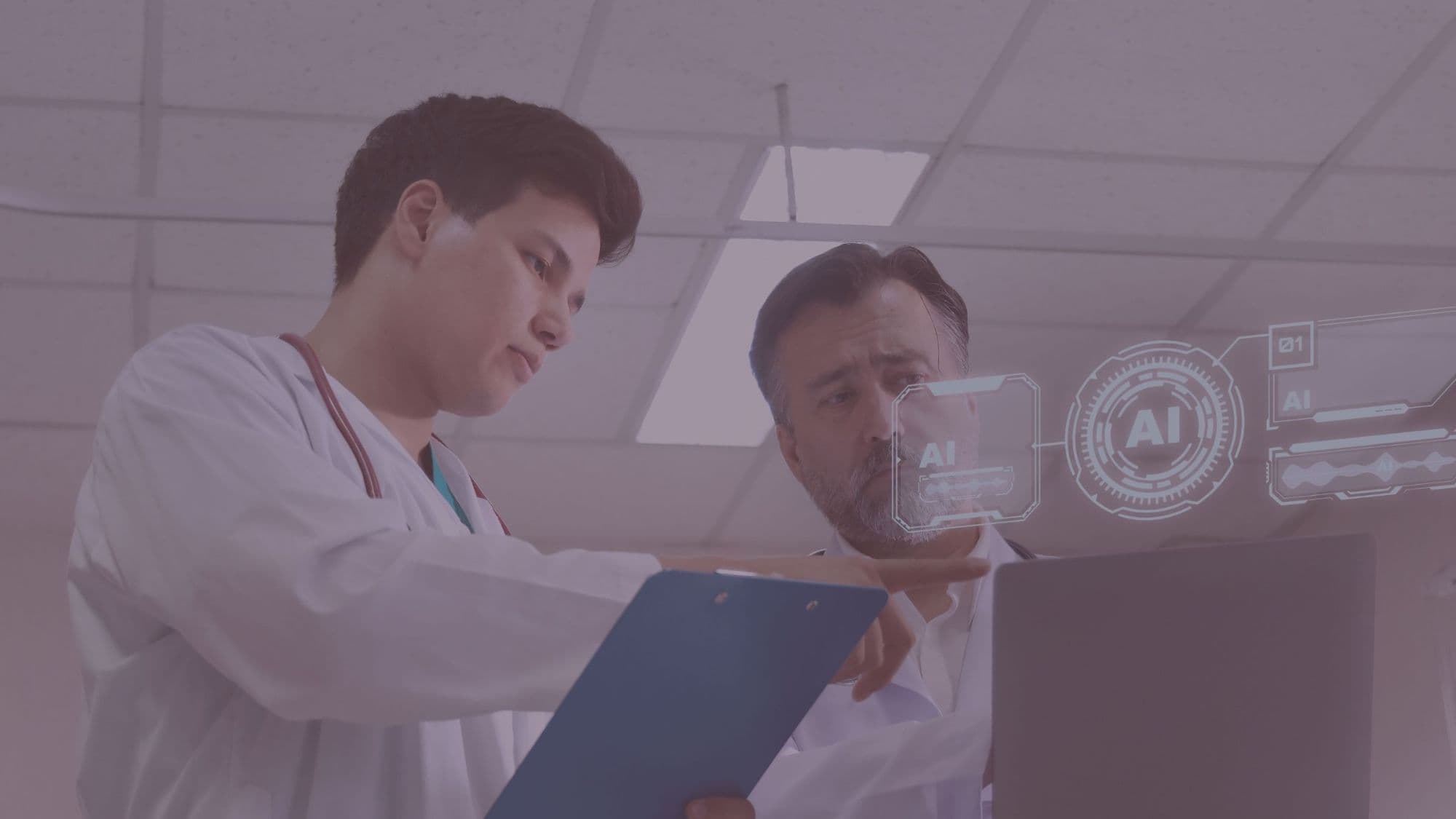 Two healthcare professionals reviewing AI-assisted analytics on a laptop